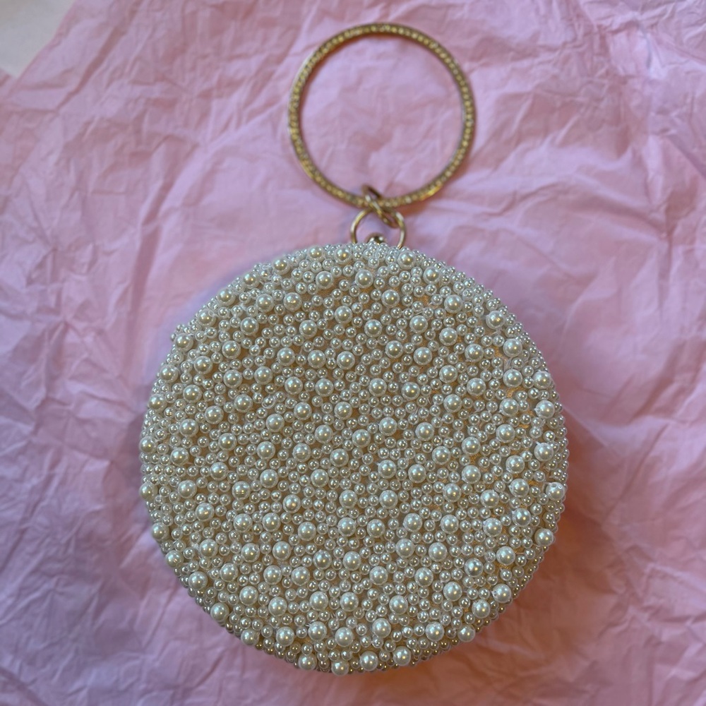 Elegant Pearl-Embellished Round Clutch